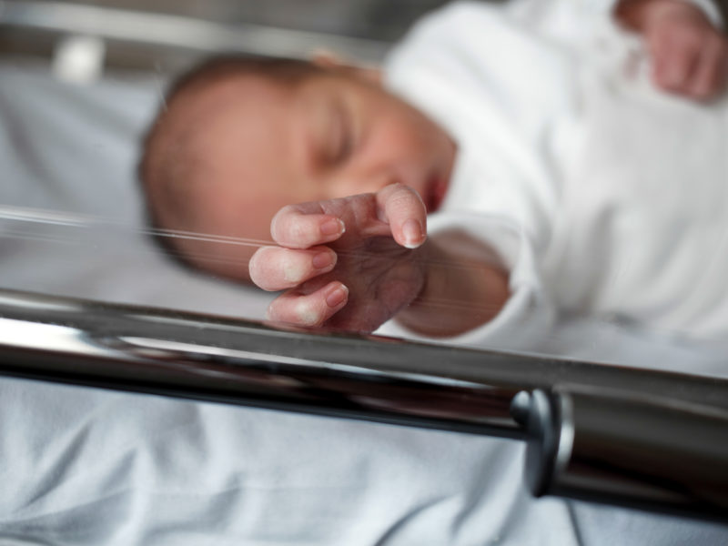 Newborn Baby In Hospital Crib - Medical Cannabis - Cannabiz
